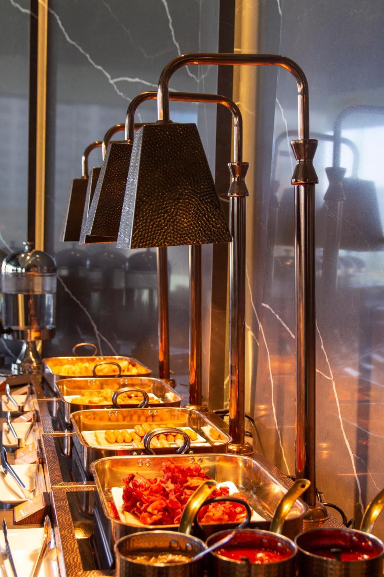 M Hotel Danang מראה חיצוני תמונה A chafing dish